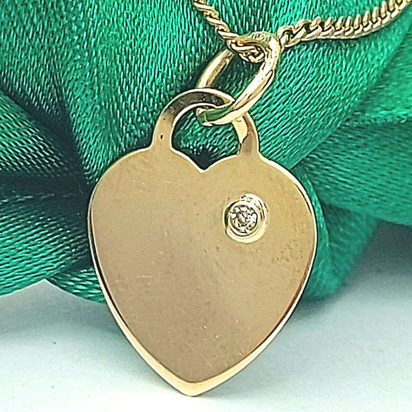 Gold heart outlet charm with diamond chip